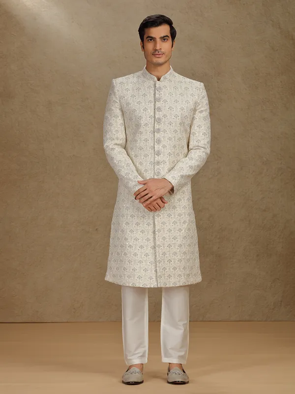 Elegant cream silk sherwani for grand weddings