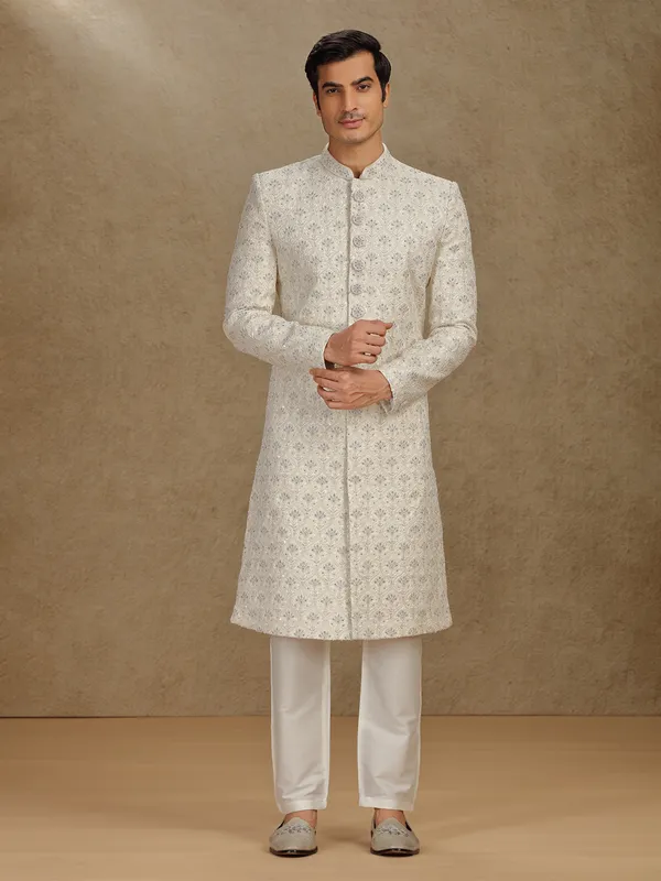 Elegant cream silk sherwani for grand weddings