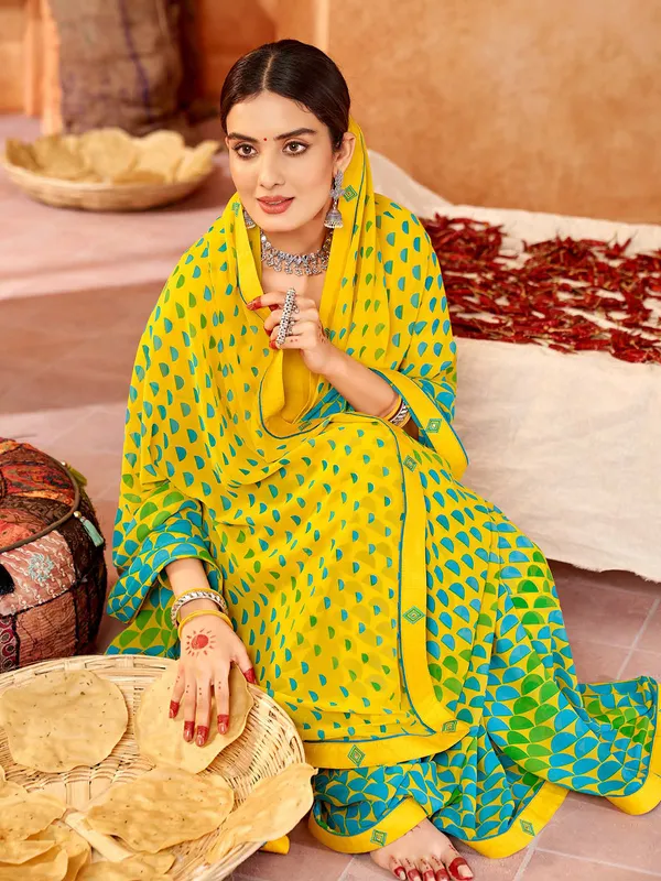 Elegant yellow printed saree in georgette