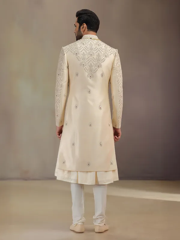Elegant golden silk peshwa style sherwani for groom