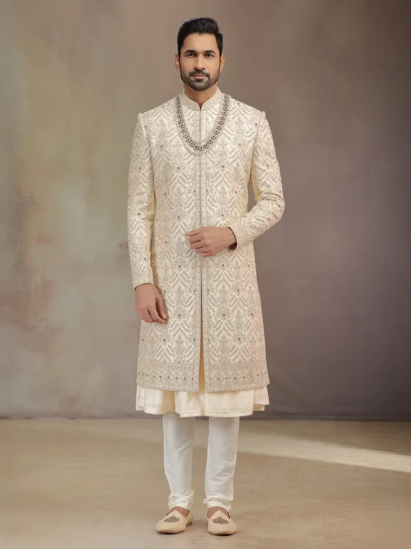 Elegant golden silk peshwa style sherwani for groom