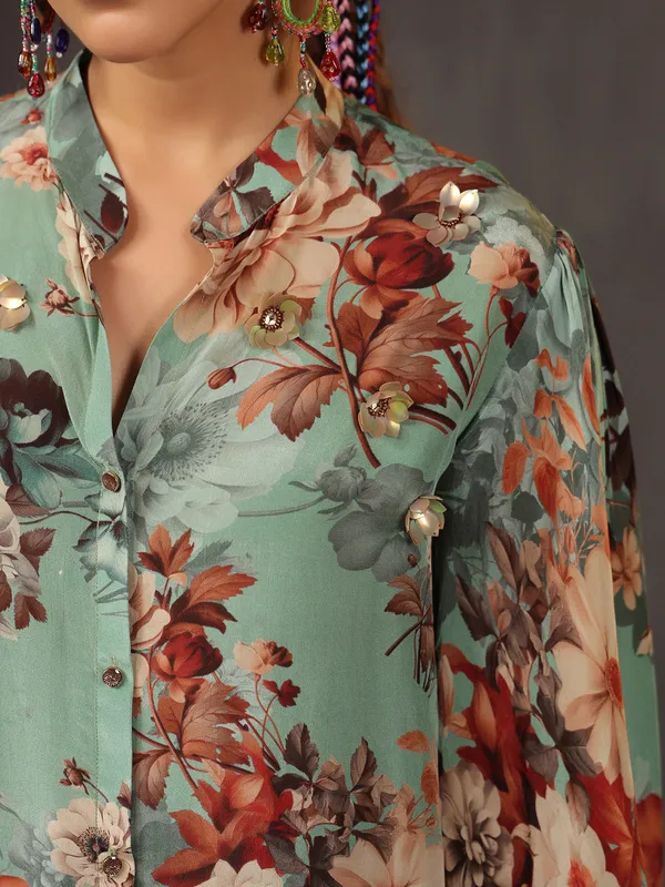 Elegant green silk top with floral print