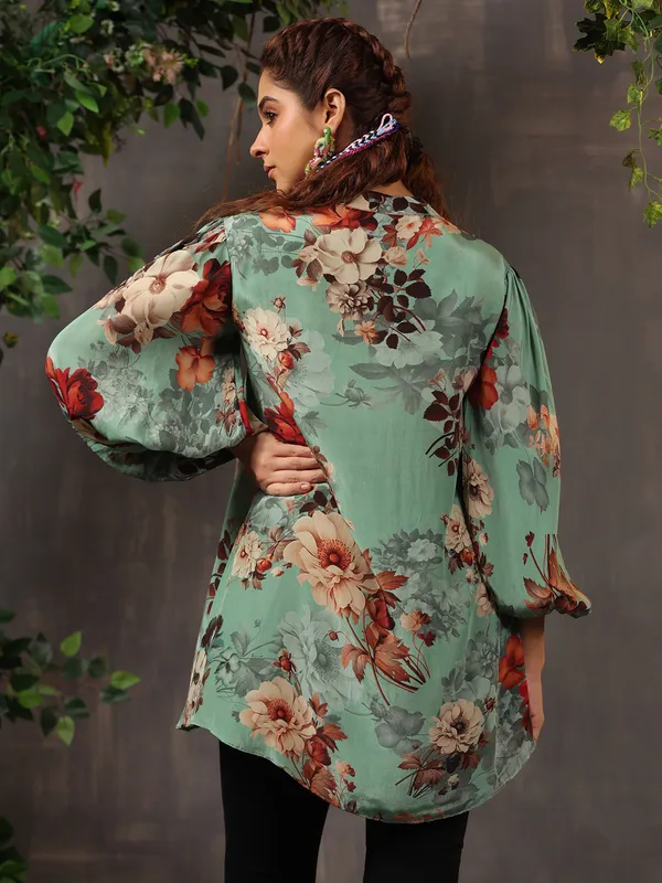 Elegant green silk top with floral print