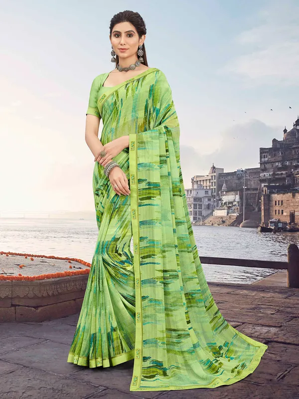 Elegant light green printed saree