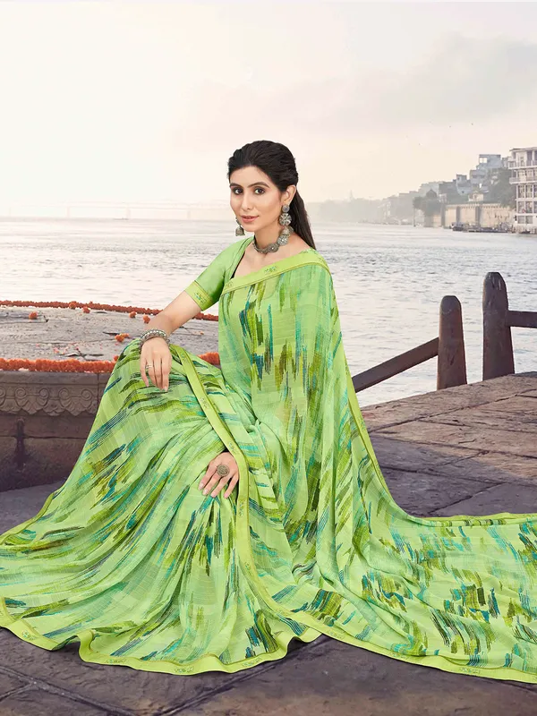 Elegant light green printed saree