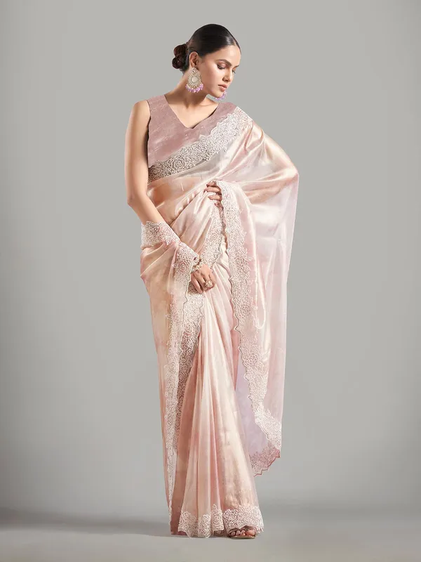 Elegant light pink tissue silk saree