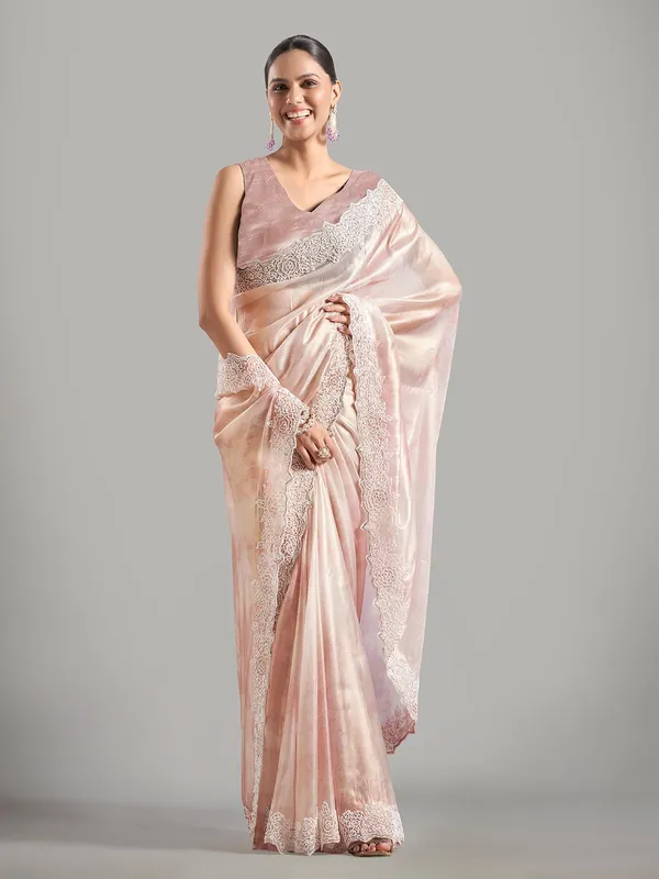 Elegant light pink tissue silk saree