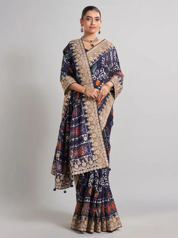Elegant navy patola silk saree with gota and sequin accents