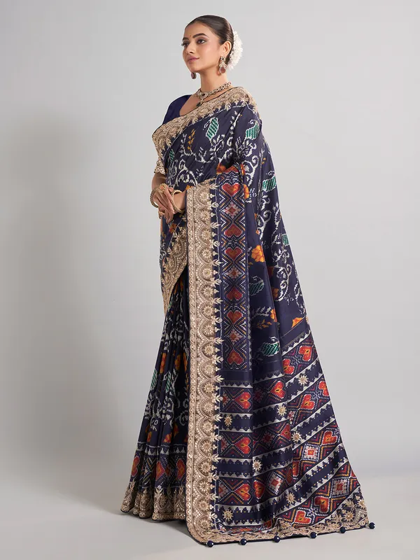 Elegant navy patola silk saree with gota and sequin accents