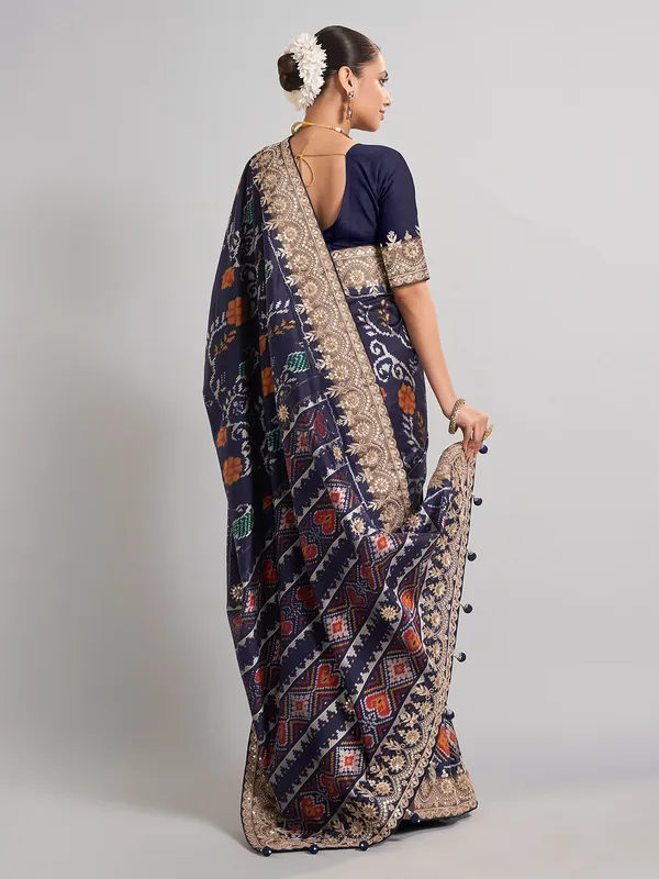 Elegant navy patola silk saree with gota and sequin accents