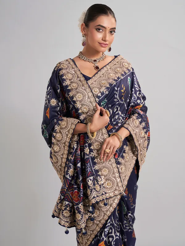 Elegant navy patola silk saree with gota and sequin accents
