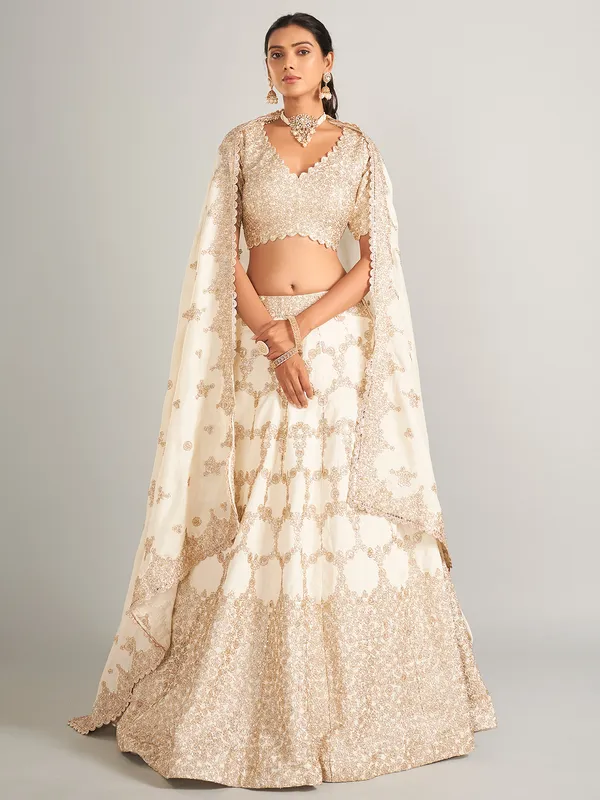 Elegant off-white lehenga choli in raw silk