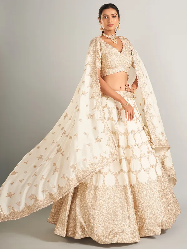 Elegant off-white lehenga choli in raw silk
