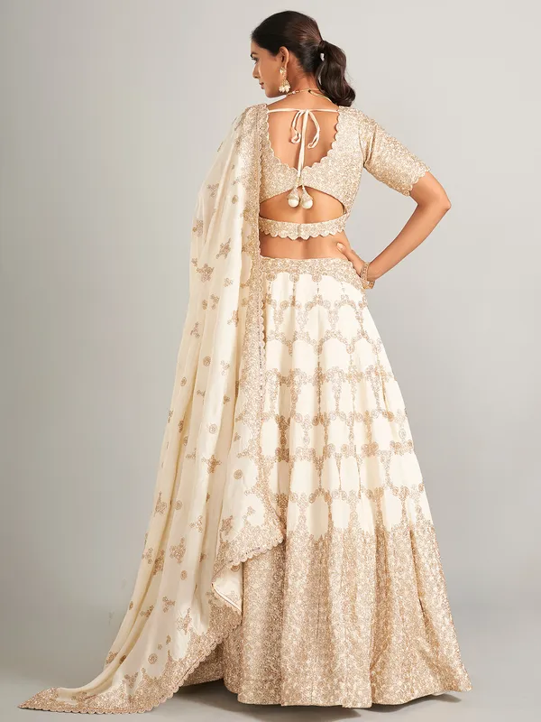 Elegant off-white lehenga choli in raw silk