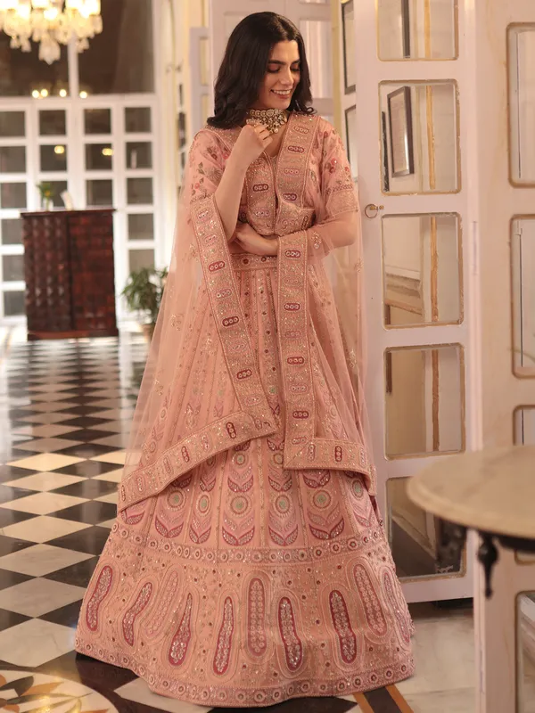 Elegant peach lehenga choli in raw silk