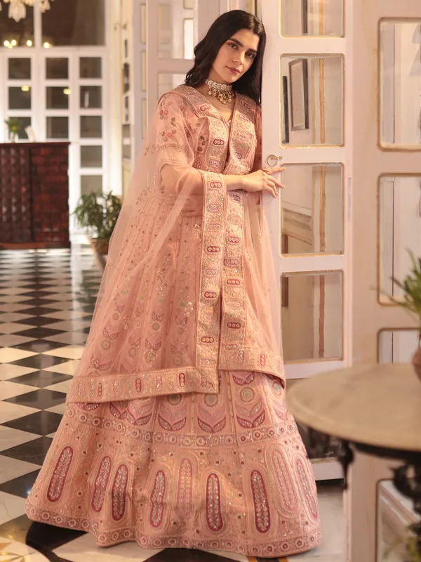 Elegant peach lehenga choli in raw silk