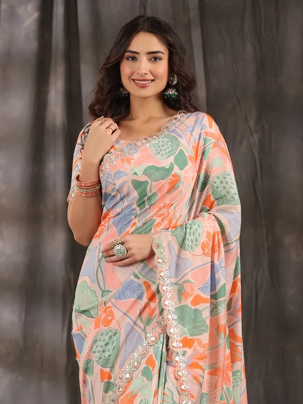 Elegant peach muslin printed saree