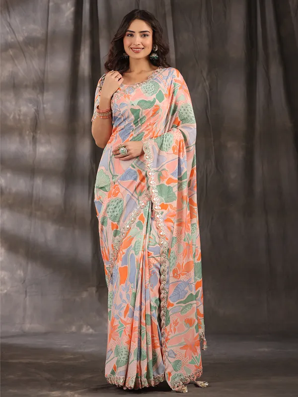 Elegant peach muslin printed saree