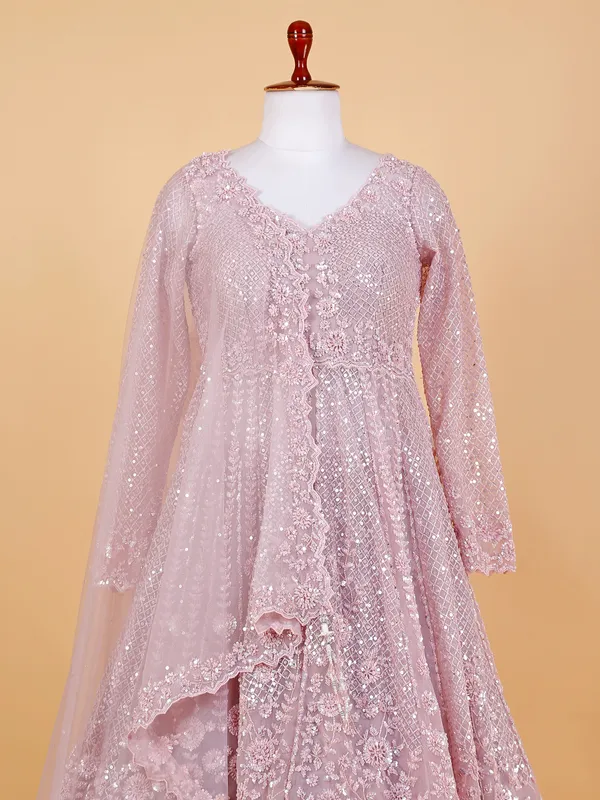 Elegant pink net lehenga suit
