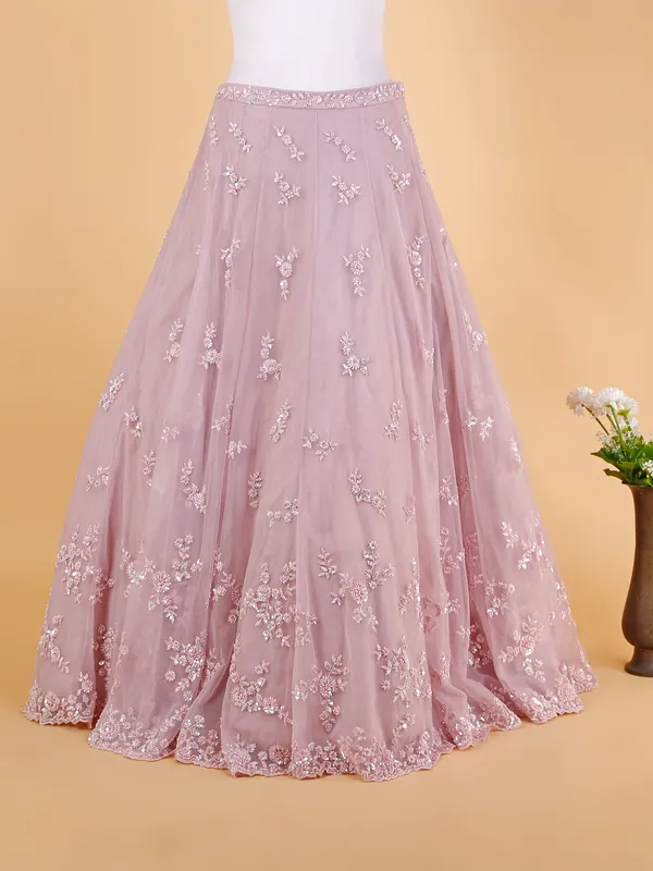 Elegant pink net lehenga suit