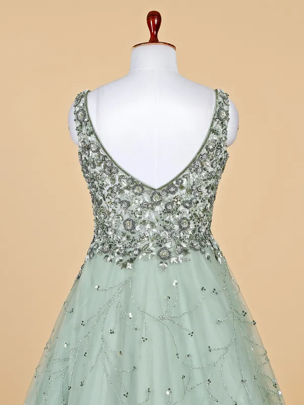 Elegant pista green net gown