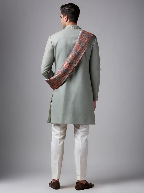 Elegant pista green silk plain sherwani