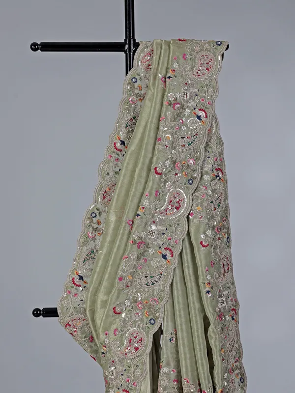 Elegant pista green tissue silk saree