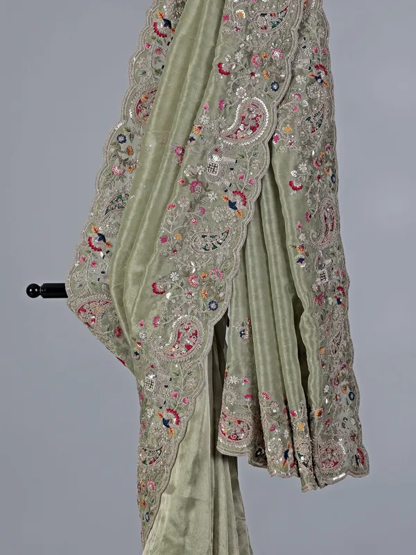 Elegant pista green tissue silk saree