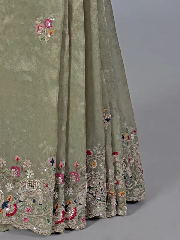 Elegant pista green tissue silk saree