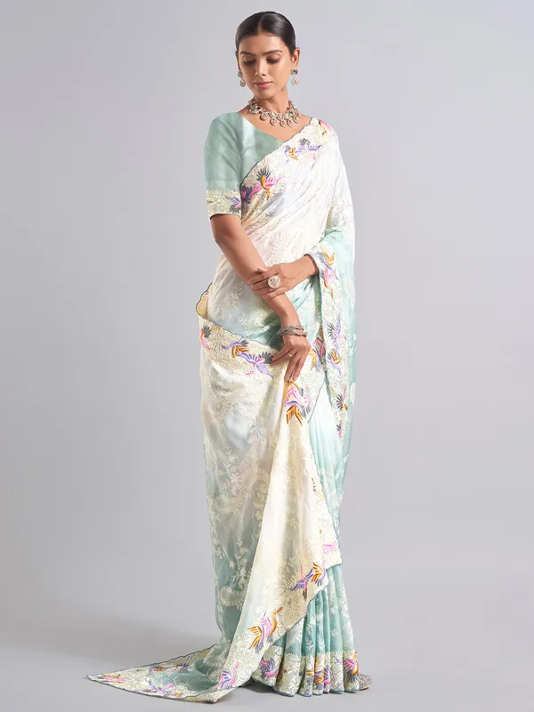 Elegant white and mint blue saree