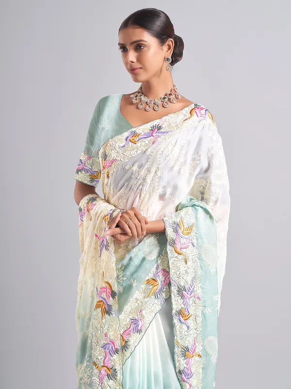 Elegant white and mint blue saree