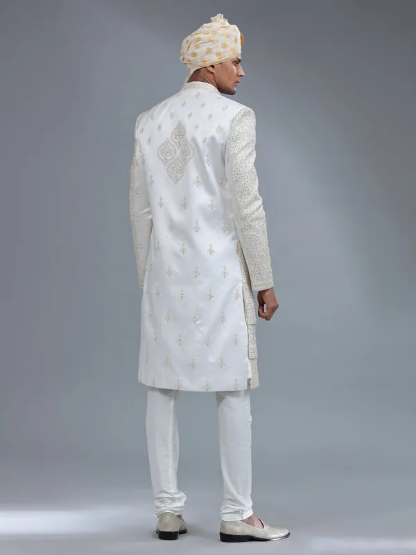 Elegant white jacket style sherwani