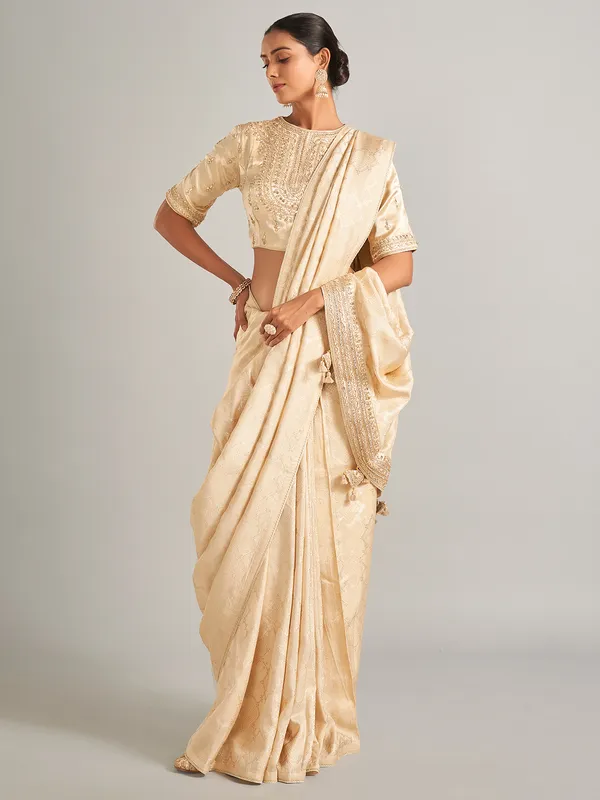 Elegantry beige silk saree with zari work