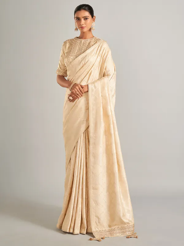 Elegantry beige silk saree with zari work