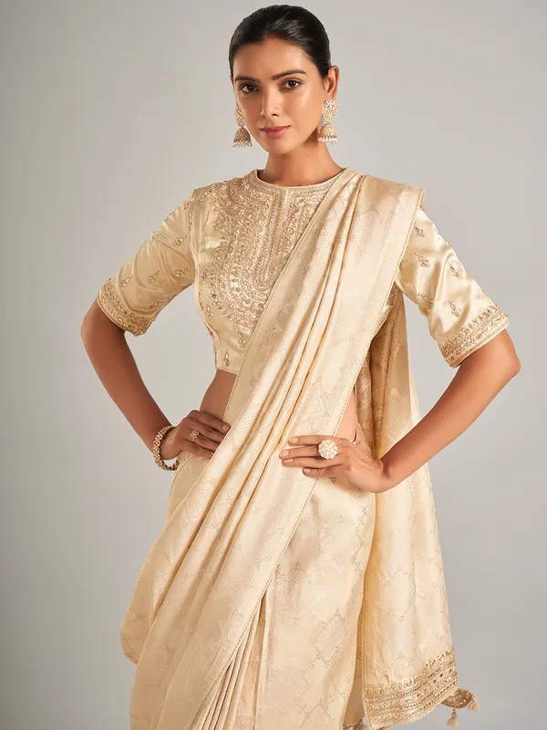 Elegantry beige silk saree with zari work