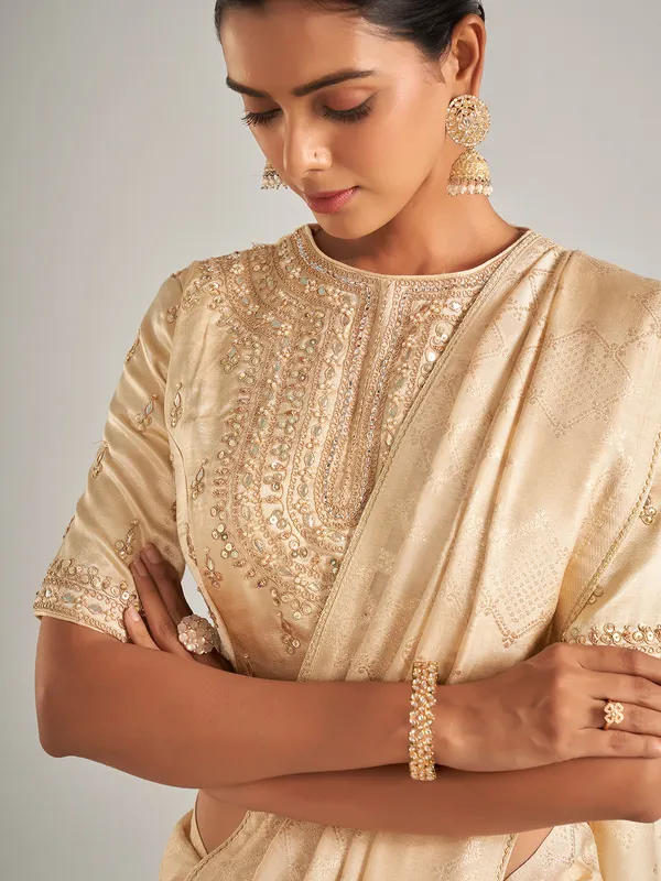 Elegantry beige silk saree with zari work