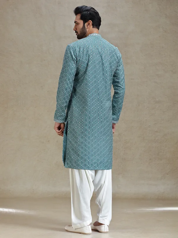 English green serene kurta set in symmetrical embroidery