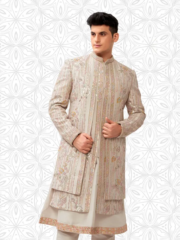 Ethereal cream grooms sherwani in terry rayon