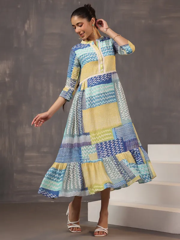 Eye catching beige and blue printed cotton silk kurti