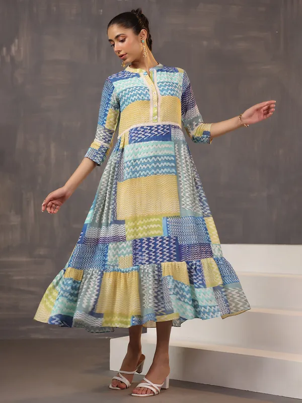 Eye catching beige and blue printed cotton silk kurti