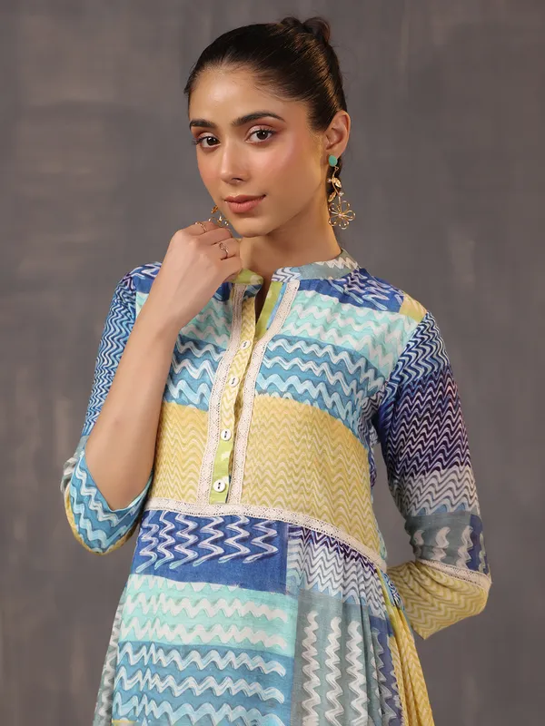 Eye catching beige and blue printed cotton silk kurti