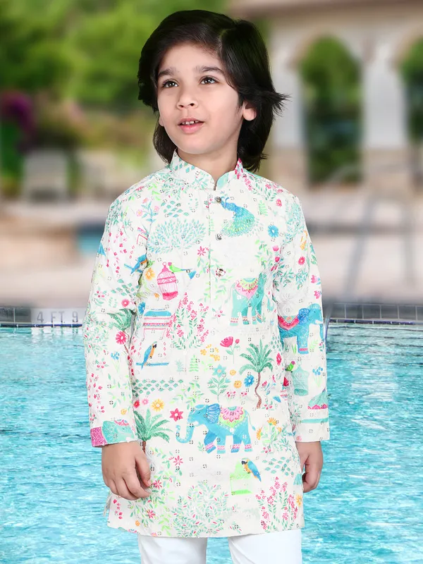 Eye catching off-white cotton silk boys kurta set with abstract print