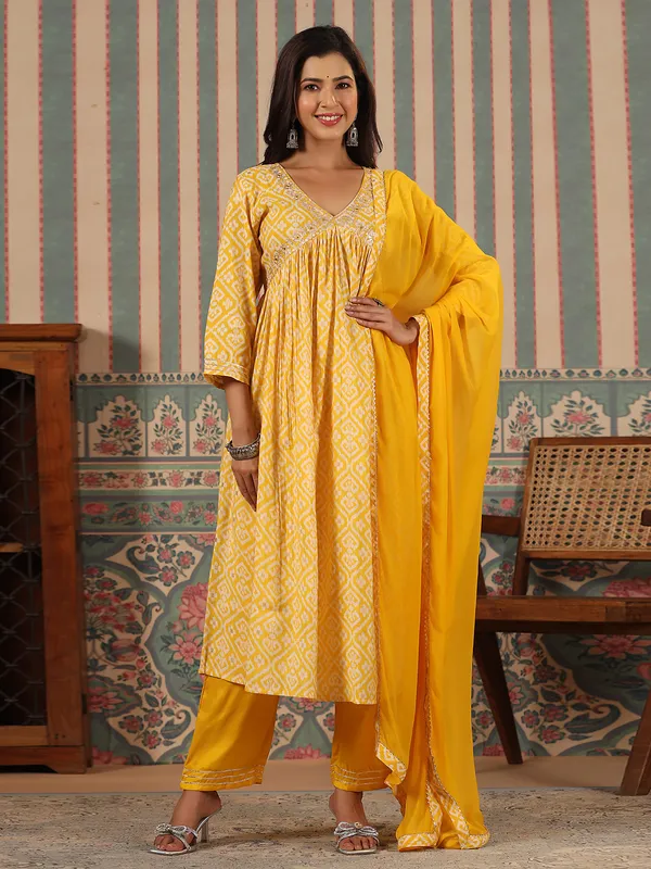 Fablous yellow cotton alia cut kurti set