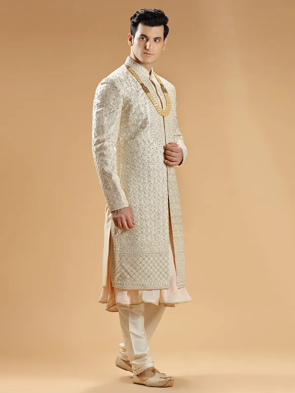 Fabulous peach raw silk groom sherwani