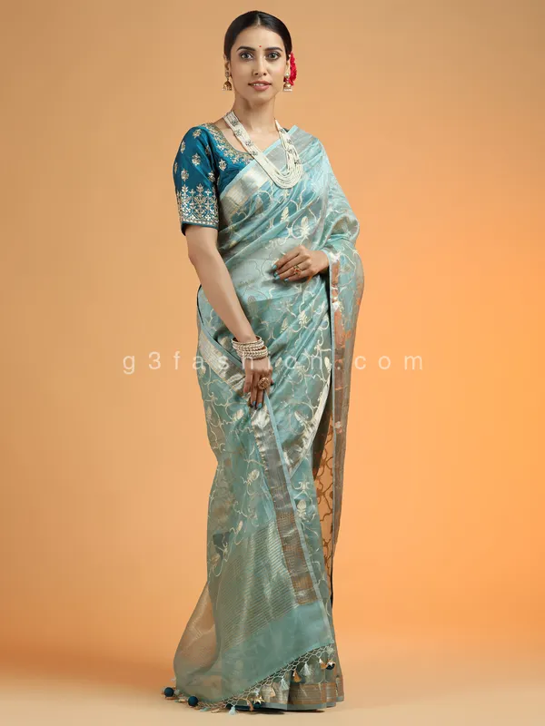 Fabulous powder blue organza saree for party look