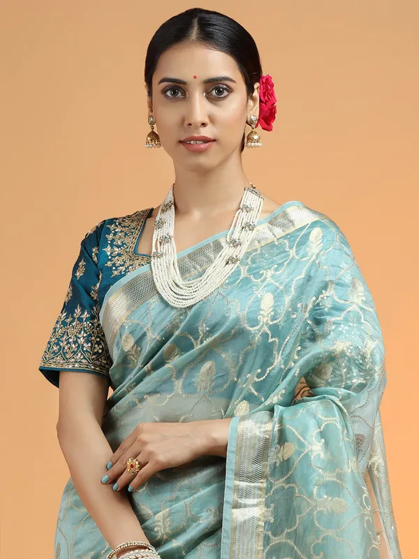 Fabulous powder blue organza saree for party look