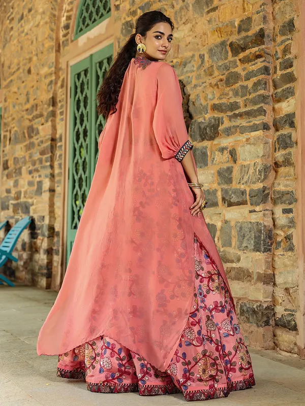 Fascinating silk peach lehenga choli with shrug