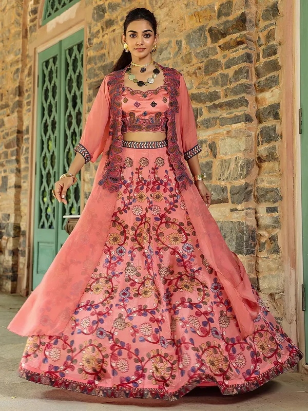 Fascinating silk peach lehenga choli with shrug