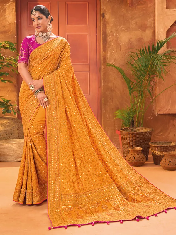 Fashionable mustard yellow banarasi silk saree