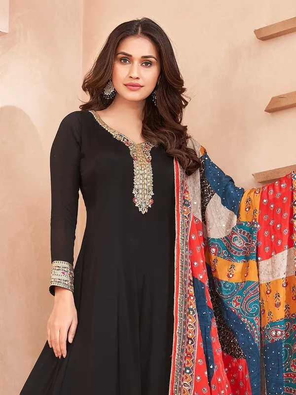 Festive black silk floor length suit with dupatta